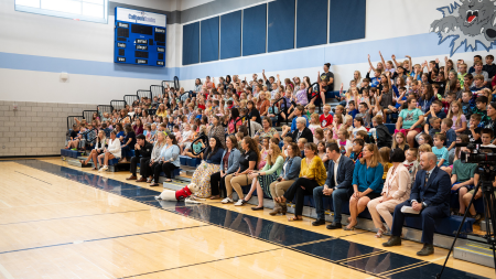 Tora with students and staff of Elkins High School