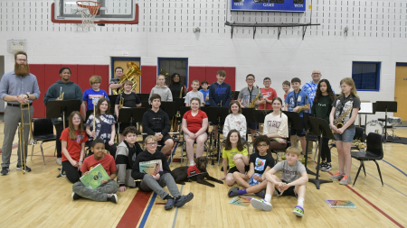 Tora with students and staff of Elkins High School